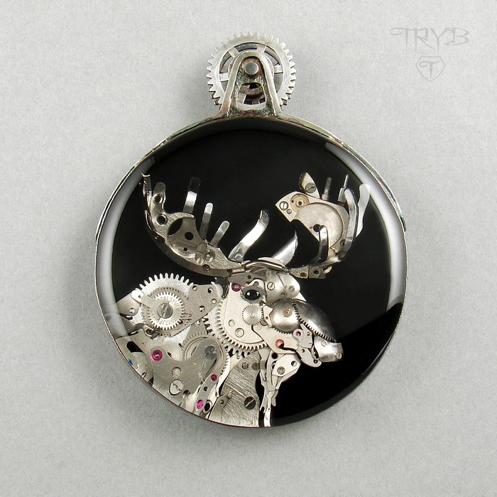 Sterling silver pendant with moose sculpture of watch parts