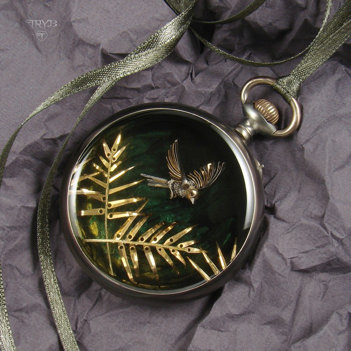 Tropical bird and leaves pendant