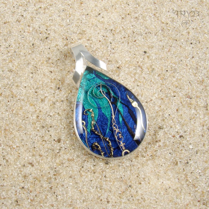 Sea inspired pendant from watch parts and silver