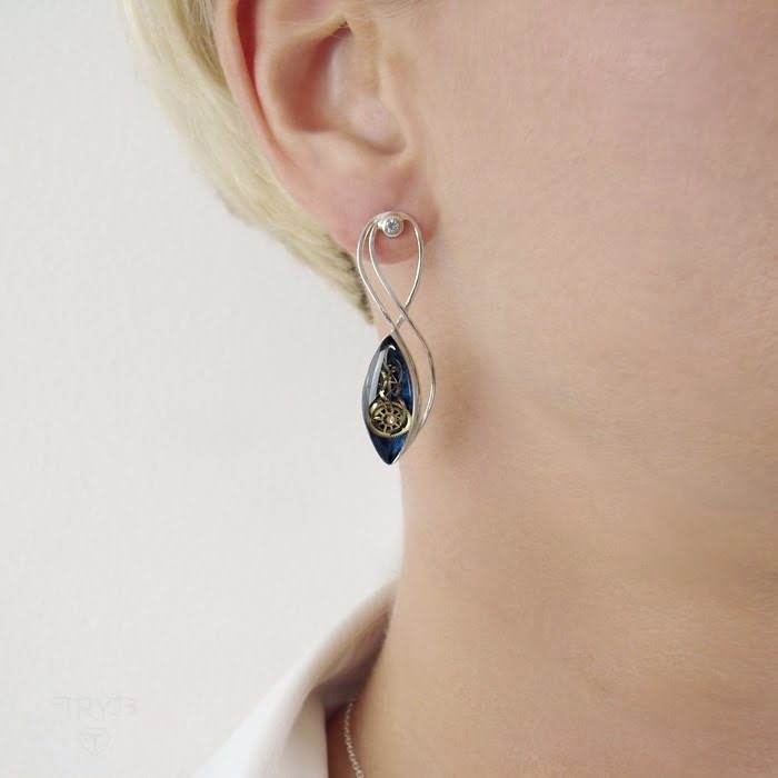 Srebrne kolczyki z kosmosem i cyrkoniami