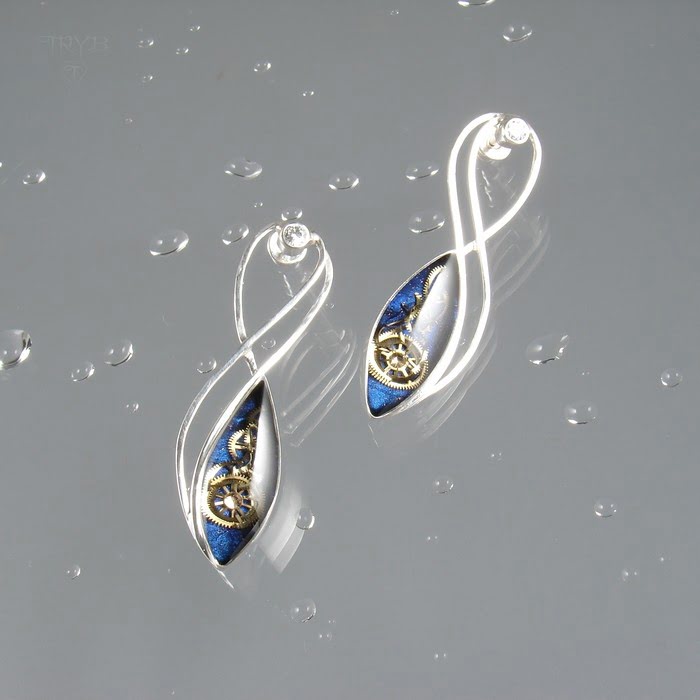 Wiszące kolczyki ze srebra i części zegarków