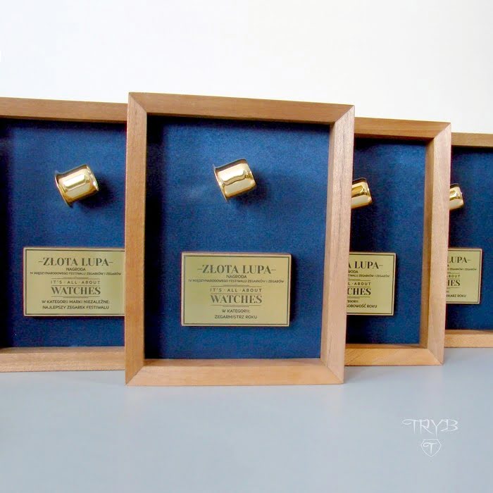 Złote lupy - eleganckie statuetki na zamówienie