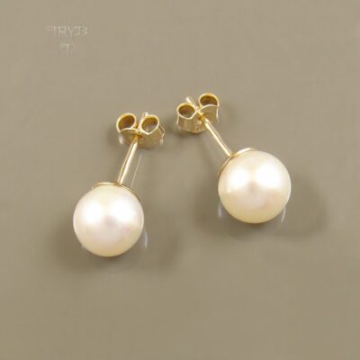 Piękne kolczyki ze złota z perłami