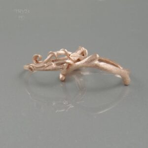 Roślinne obrączki gałązki zrobione z różowego złota 585
